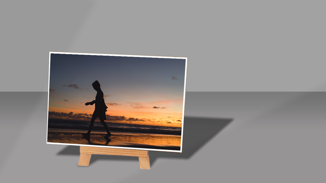 Foto sunset dengan langit jingga dan ungu